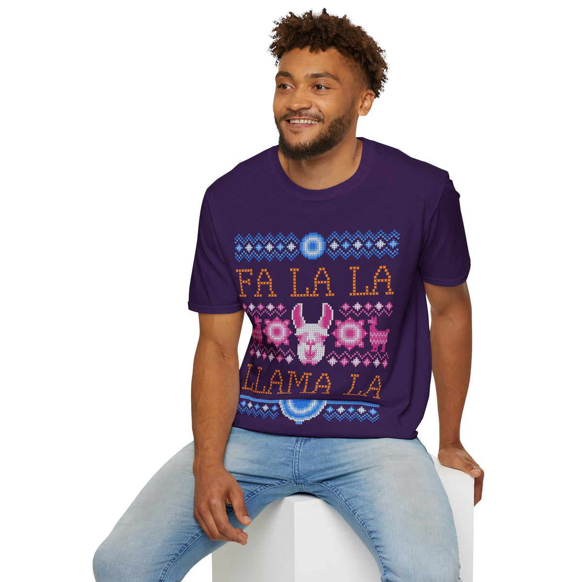 Man wearing a purple t-shirt with 'Fa La La Llama La' design on a white background