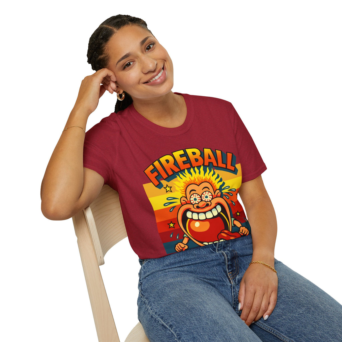 Person wearing a red t-shirt with a cartoon character and 'Fireball' text.