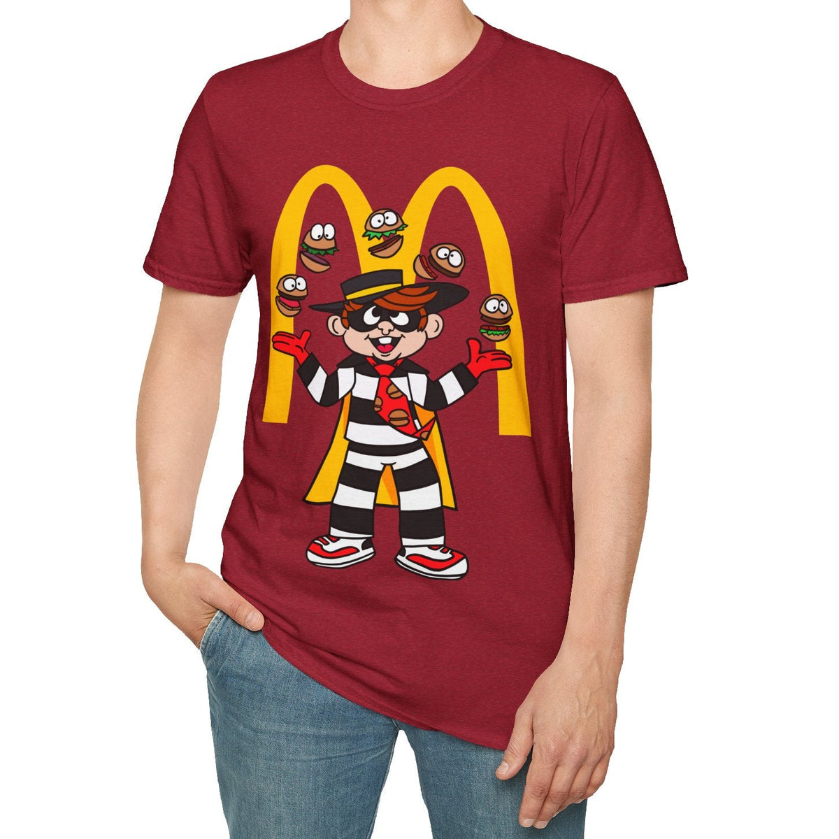 Person wearing a red t-shirt with a cartoon character design on a white background