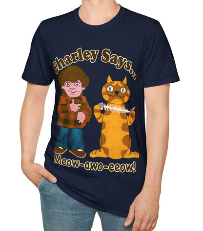 Person wearing a black t-shirt with a graphic of a boy and a cat, and text Charley Says Meow