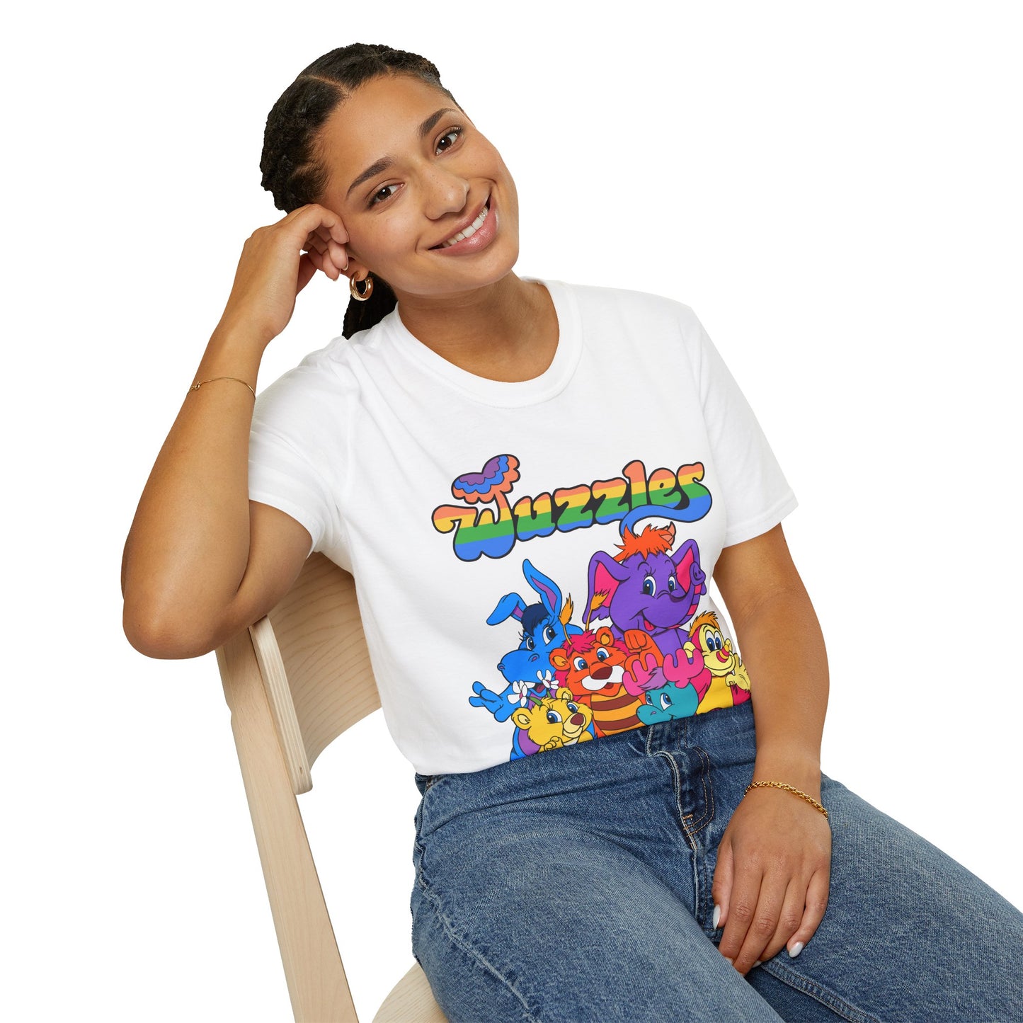 Person wearing a white t-shirt with colorful cartoon characters and text.