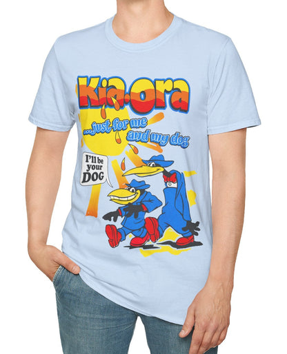 Person wearing a light blue t-shirt with colourful graphic Kia-Ora design and text.