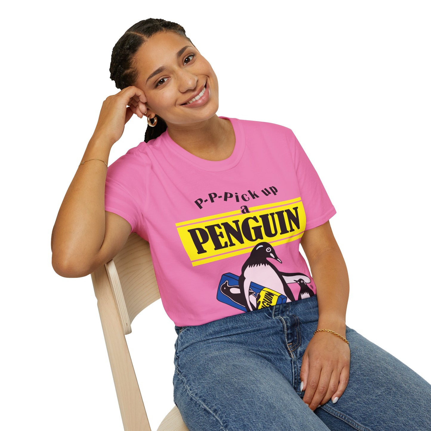 Person wearing a pink t-shirt with a penguin graphic and text P-P-Pick up a Penguin on a white background