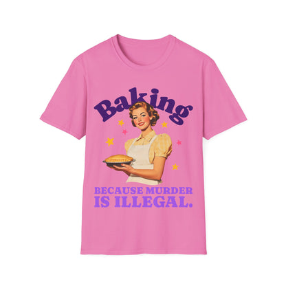 Pink t-shirt with a graphic of a woman holding a pie and text 'Baking Because Murder is Illegal' on a white background.