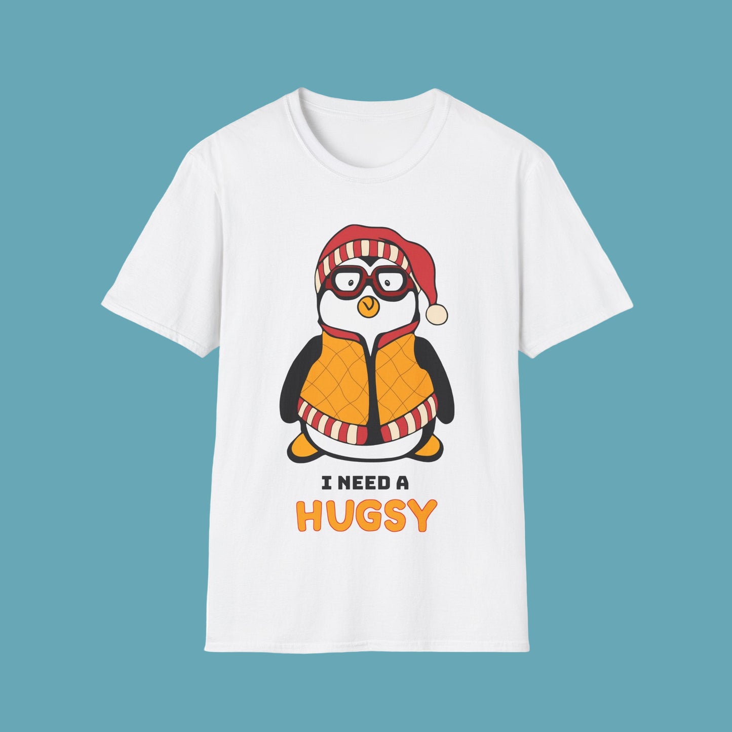 White t-shirt with a penguin graphic and I Need A Hugsy text on a white background