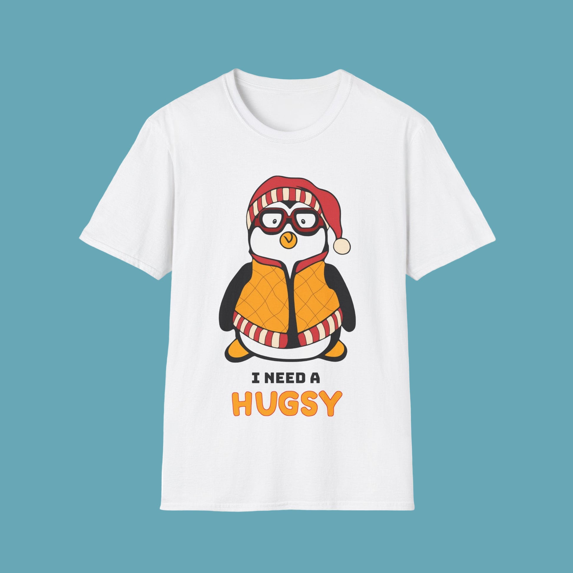 White t-shirt with a penguin graphic and I Need A Hugsy text on a white background