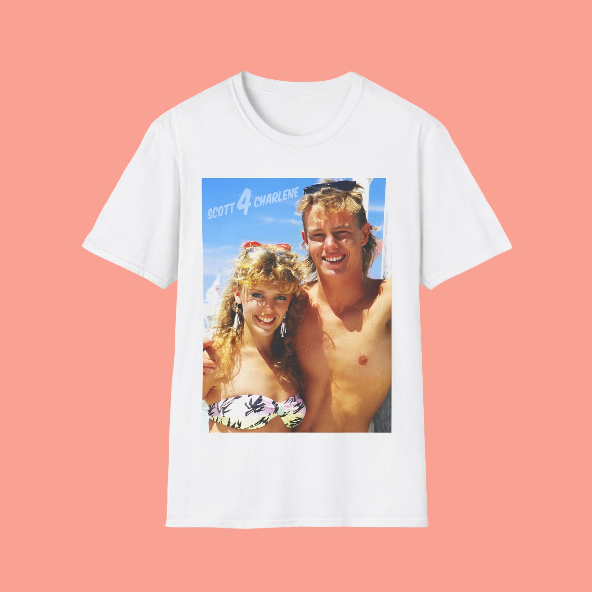 White t-shirt with a graphic of neighbours couple Scott and Charlene on a beach