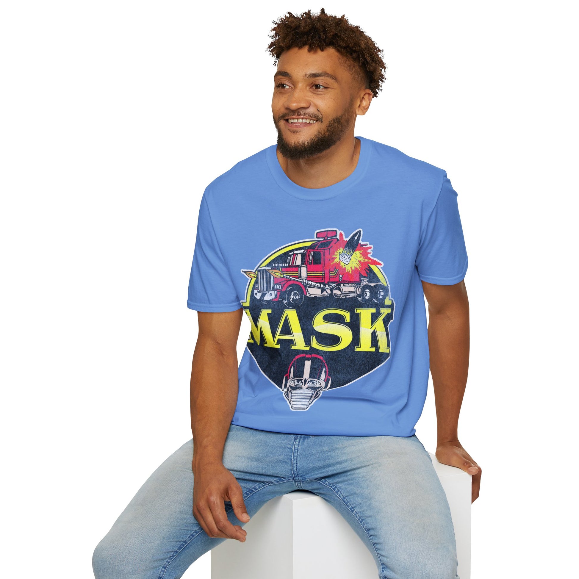 Man wearing a blue t-shirt with a colorful graphic design on a white background