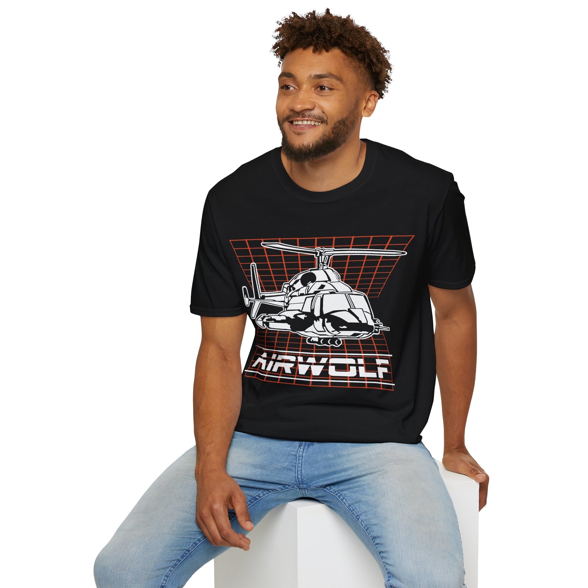 Man wearing a black t-shirt with 'Airwolf' graphic design on a white background