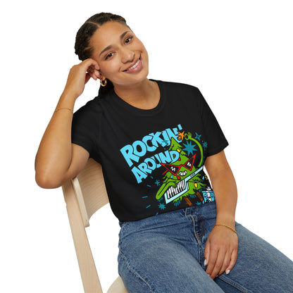 Person wearing a Retro christmas Music Inspired black t-shirt with a colourful graphic of a Christmas tree and text Rockin Around The Christmas Tree 