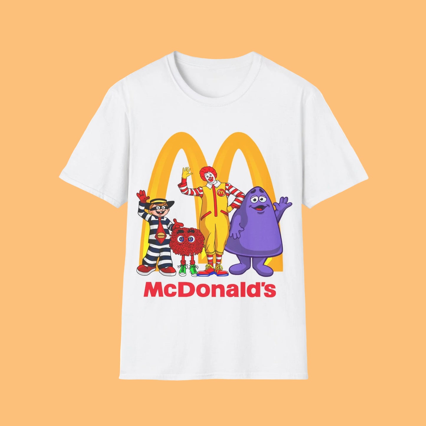 White t-shirt with McDonald's logo and cartoon characters on a white background