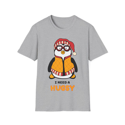Gray t-shirt with a penguin graphic and I Need A Hugsy text on a white backgrounded