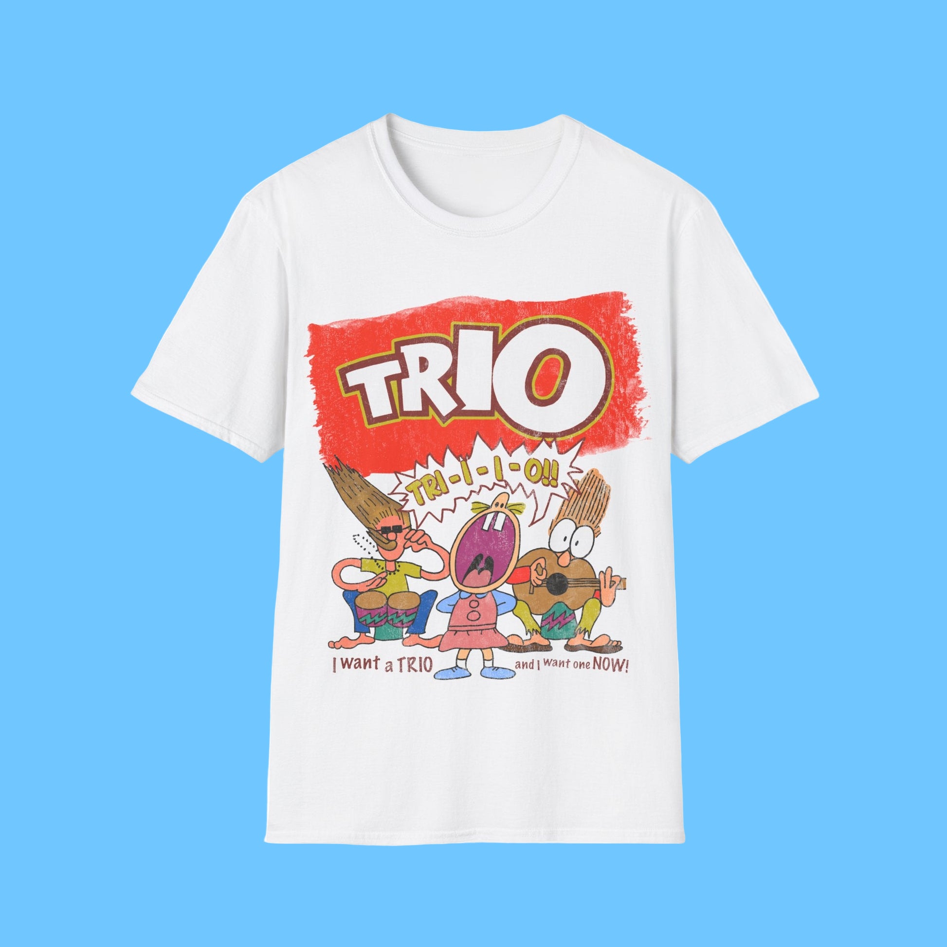 White t-shirt with cartoon characters and 'TRIO' text on a white background