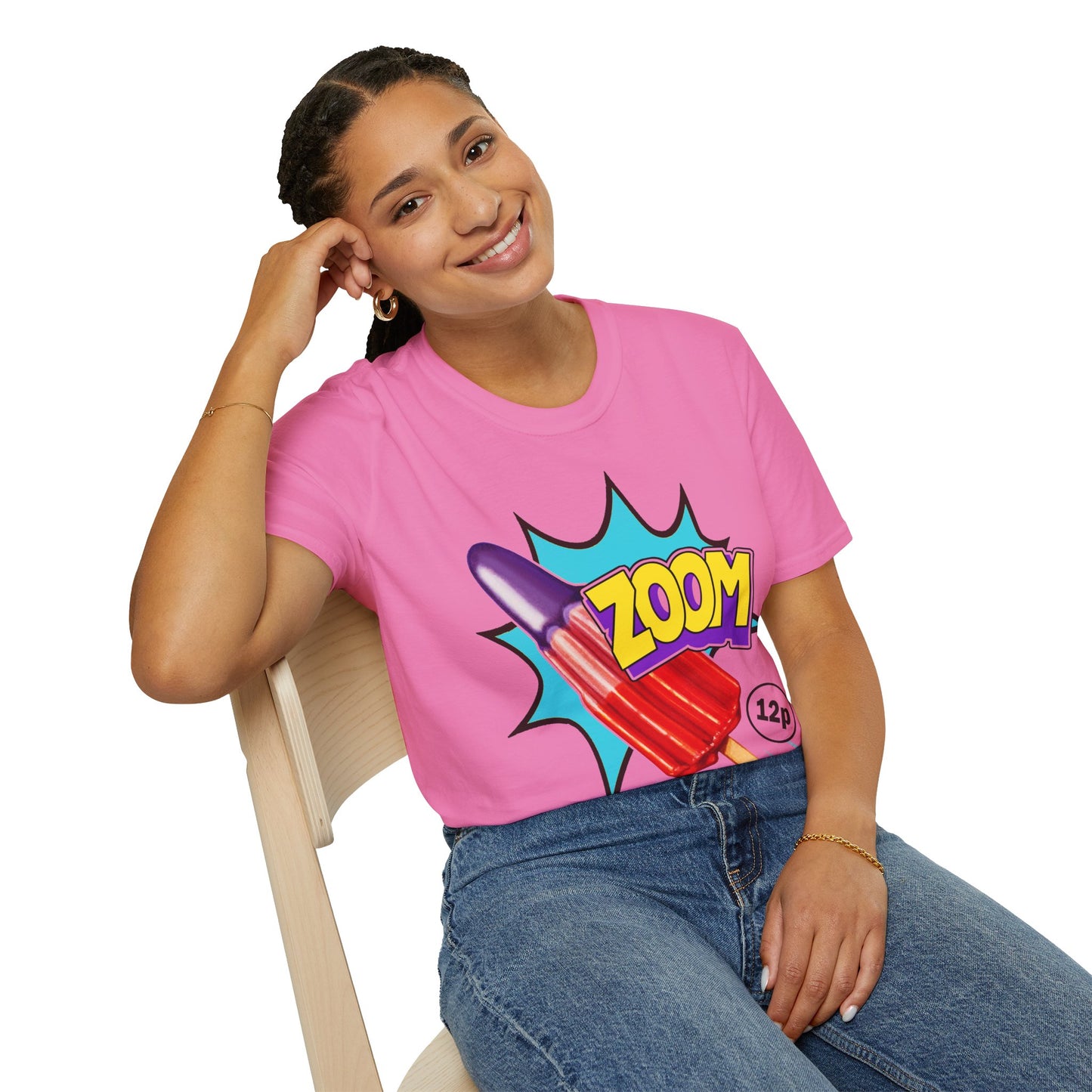 Person wearing a pink t-shirt with a 'zoom' graphic design, sitting on a chair.