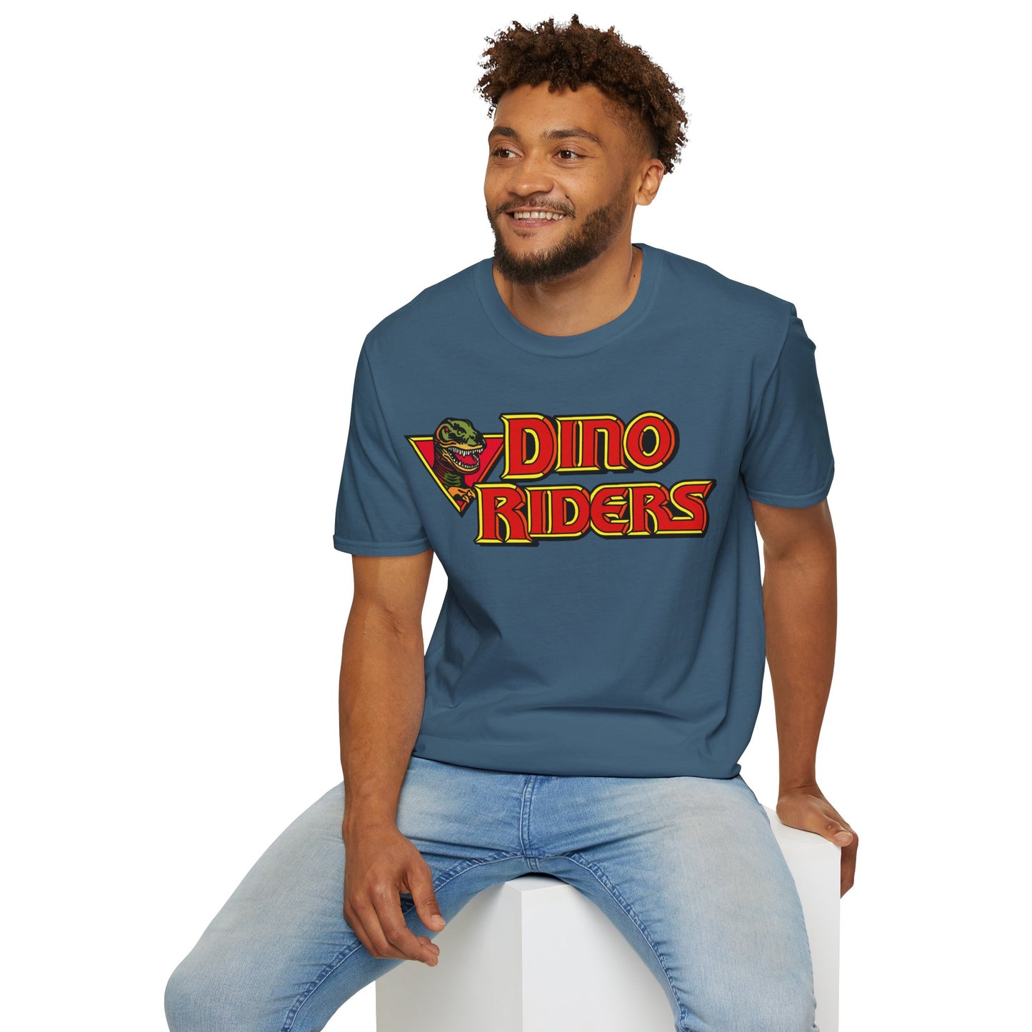 Man wearing a blue t-shirt with 'Dino Riders' logo on a white background