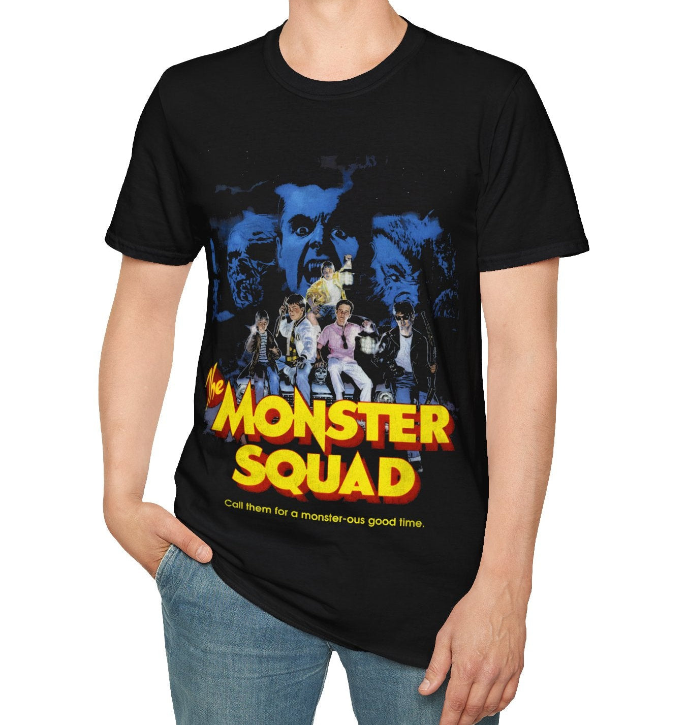 Person wearing a black t-shirt with 'Monster Squad' graphic design on a white background