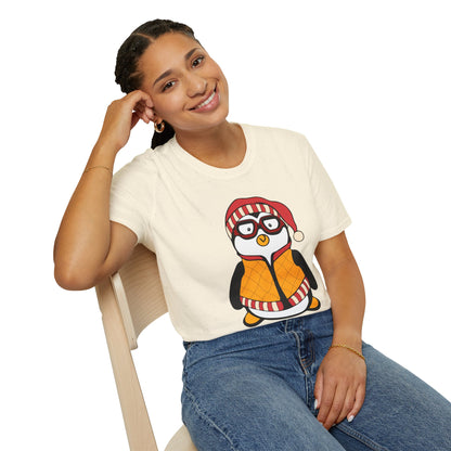 Person wearing a white t-shirt with a penguin graphic and I need a Hugsy text  whilst sitting on a chair.