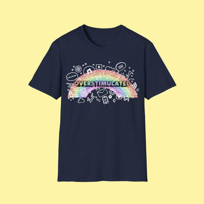 Navy blue t-shirt with colorful rainbow and 'OVERSTIMULATED' graphic on a white background