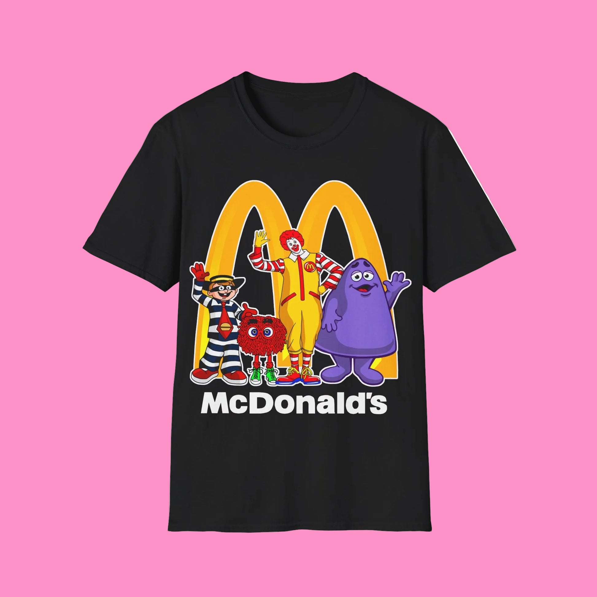 Black t-shirt with McDonald's logo and cartoon characters on a white background