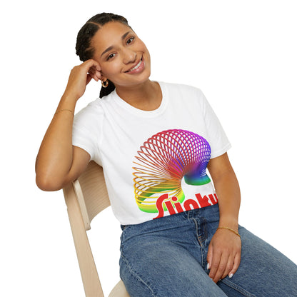 Person wearing a white t-shirt with a colorful Slinky logo sitting on a chair.