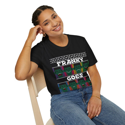 Person wearing a black t-shirt with colourful graphics and Franky Goes Pop text on a white background