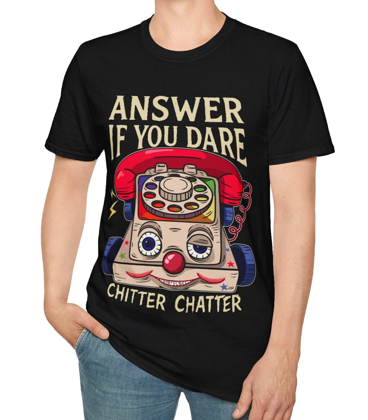 Person wearing a black t-shirt with a vintage eerie toy phone graphic and Answer if you dare text on a white background