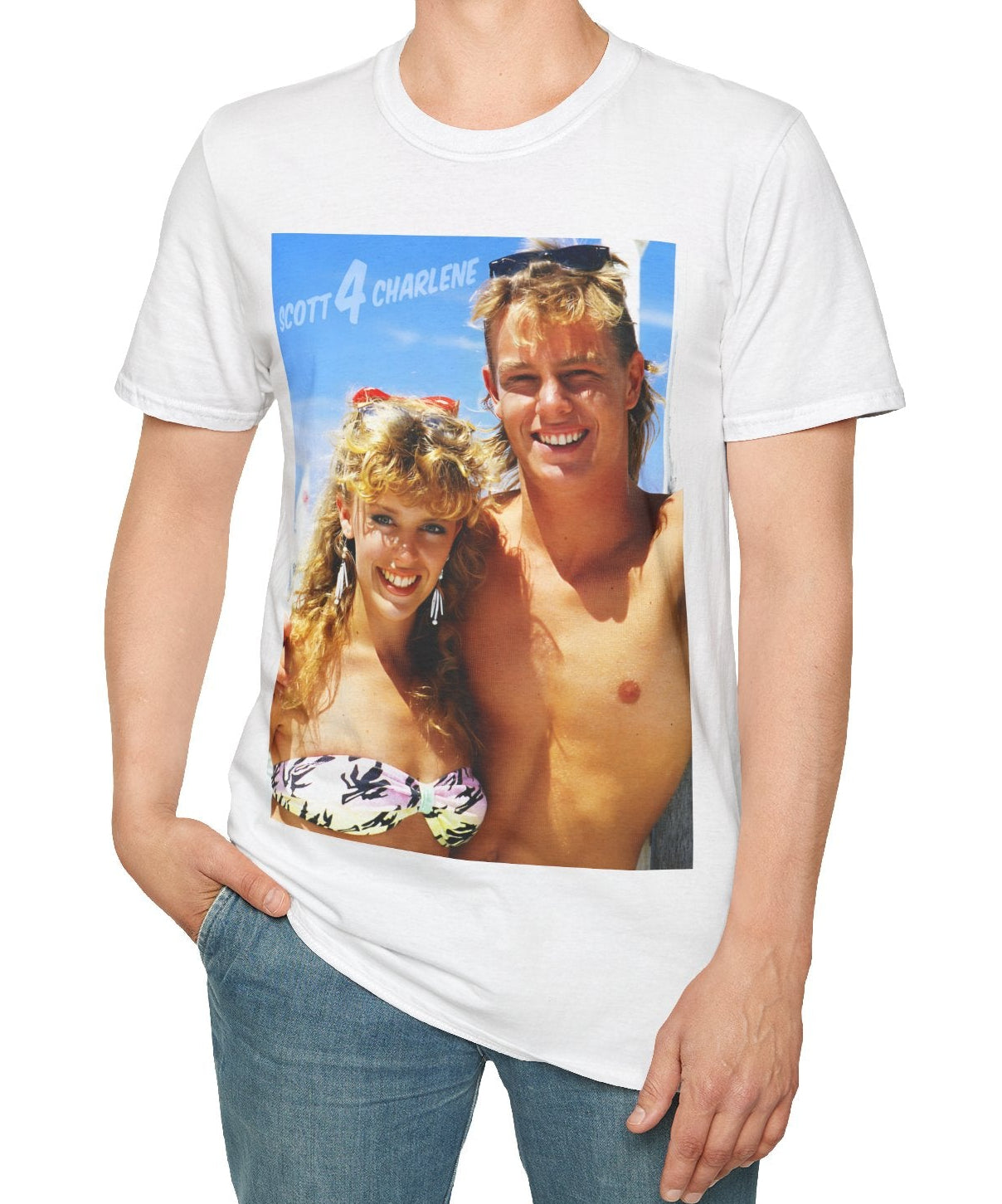Person wearing a White t-shirt with a graphic of neighbours couple Scott and Charlene on a beach