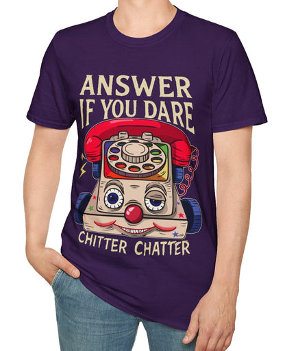 Man wearing a purple t-shirt with a eerie vintage toy phone graphic and Answer if you dare text, on a white background