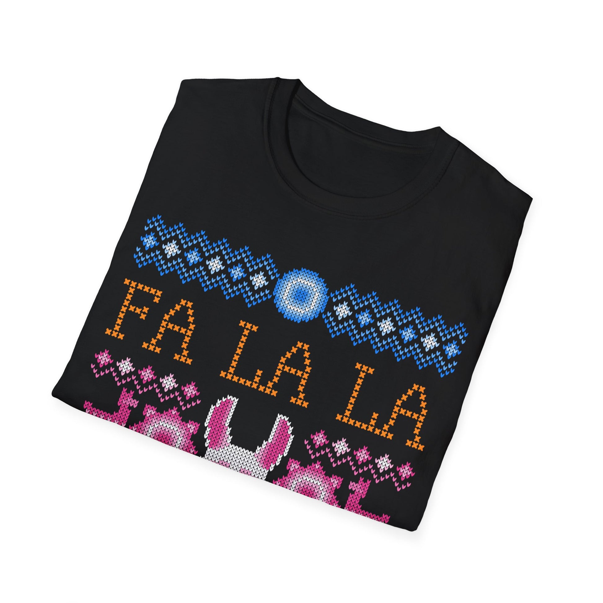 Folded black sweater with colorful 'FA LA LA' text design on a white background