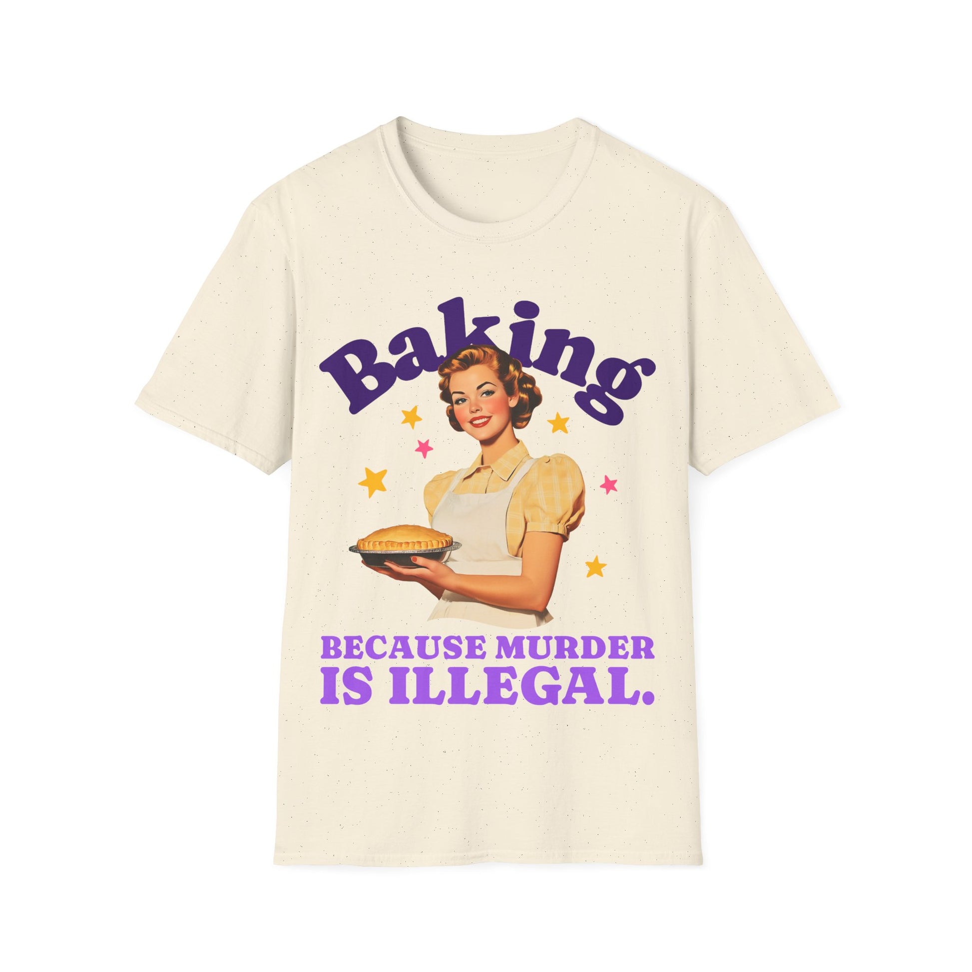 Beige t-shirt with a graphic of a woman holding a pie and text 'Baking Because Murder is Illegal' on a white background.