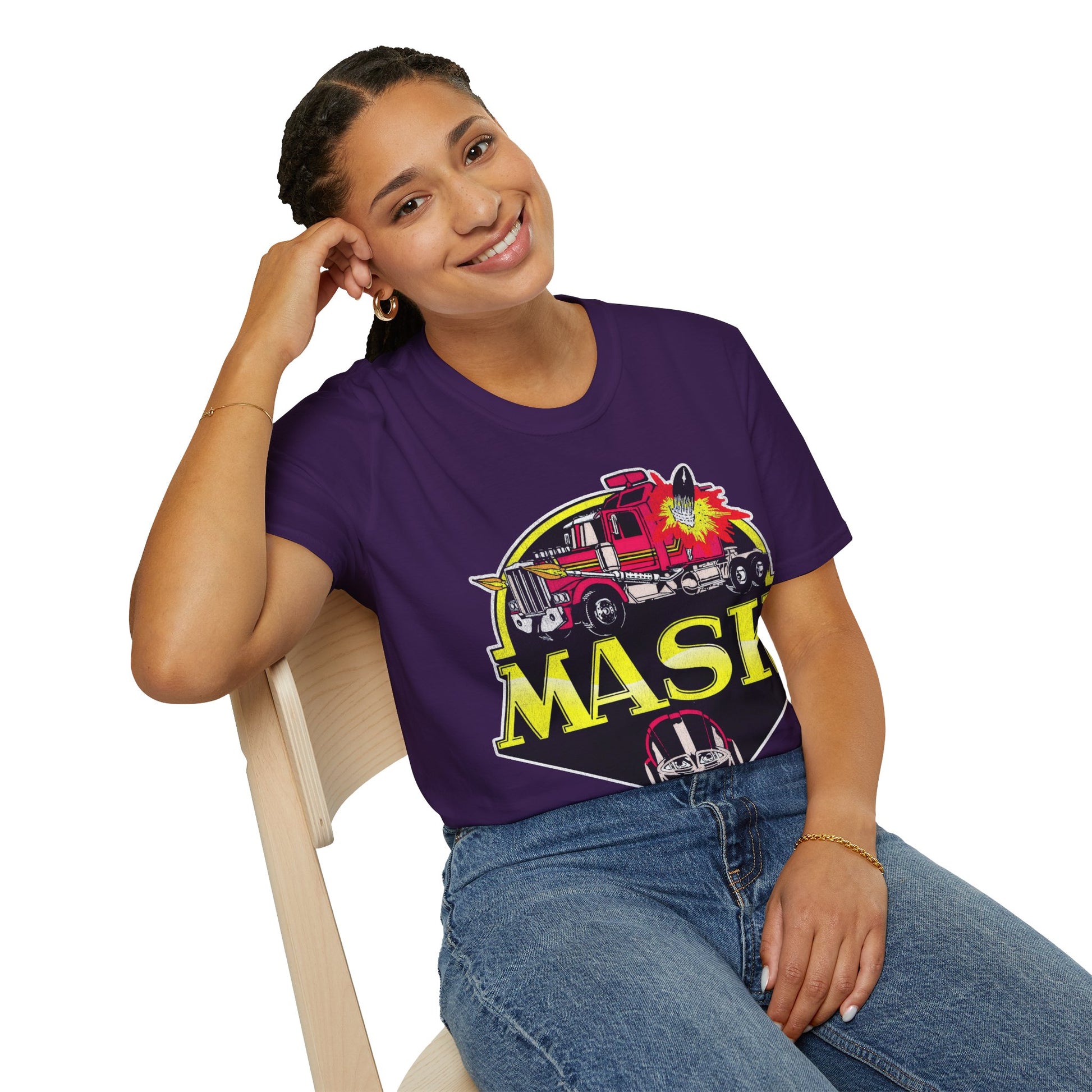 Person wearing a purple t-shirt with 'MASK' design sitting on a chair.