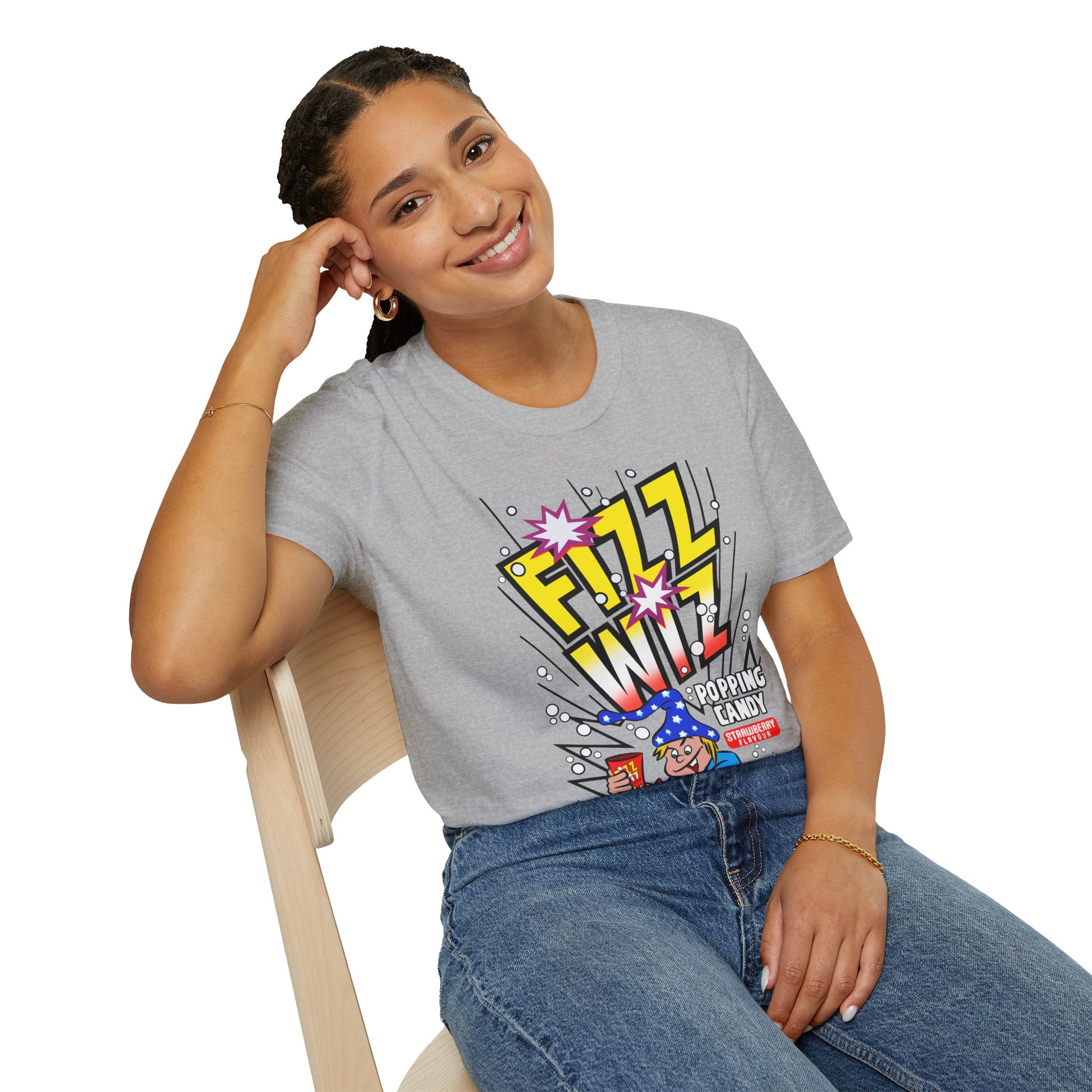 Person wearing a grey t-shirt with Fizz Wiz Popping candy colourful graphic design on a white background