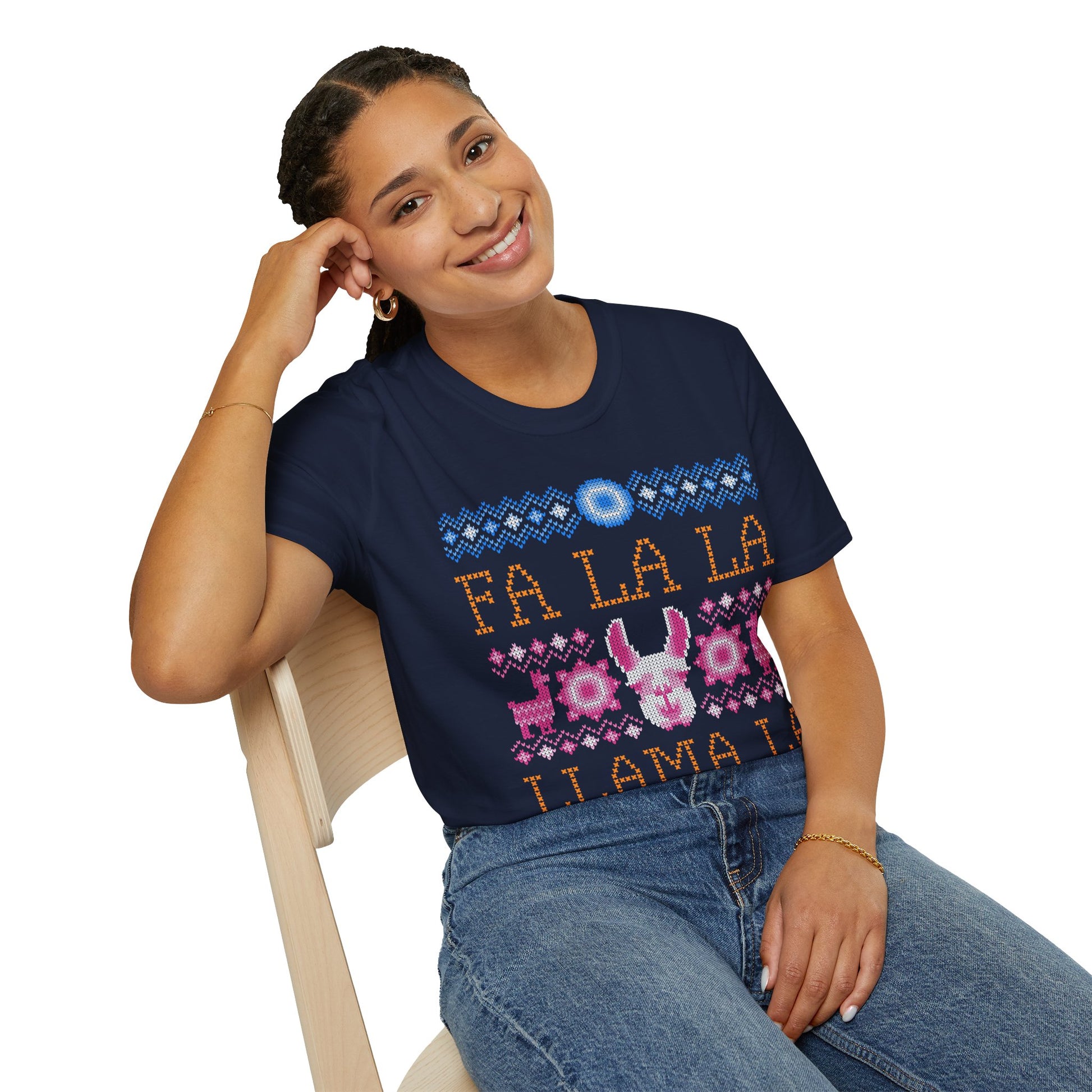 Woman wearing a navy blue t-shirt with colorful text and graphics, sitting on a chair.