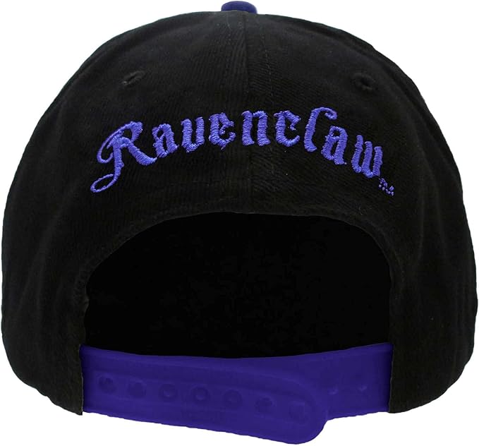 A black and blue unisex snapback cap with a Harry Potter Ravenclaw badge design on the front and Ravenclaw embroidered at the back