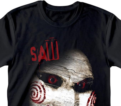 Black short sleeve T-shirt featuring a lose up eerie Saw horror movie face and I want to play a game Text,