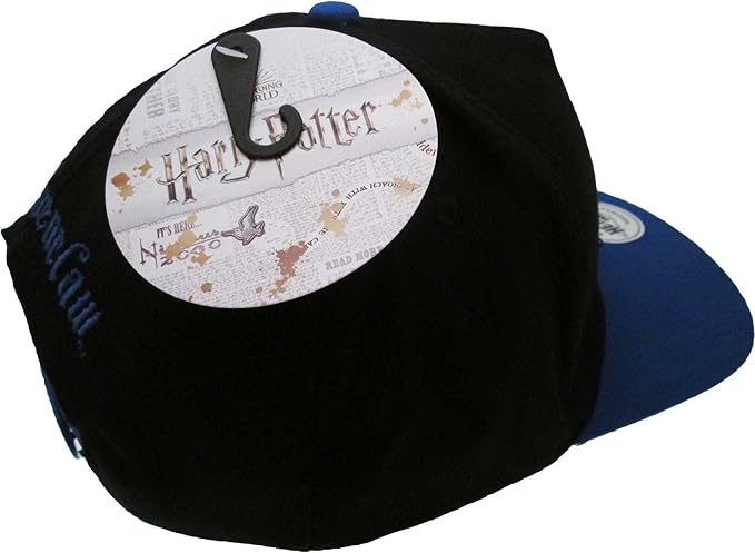 A black and blue unisex snapback cap with a Harry Potter Ravenclaw badge design on the front.