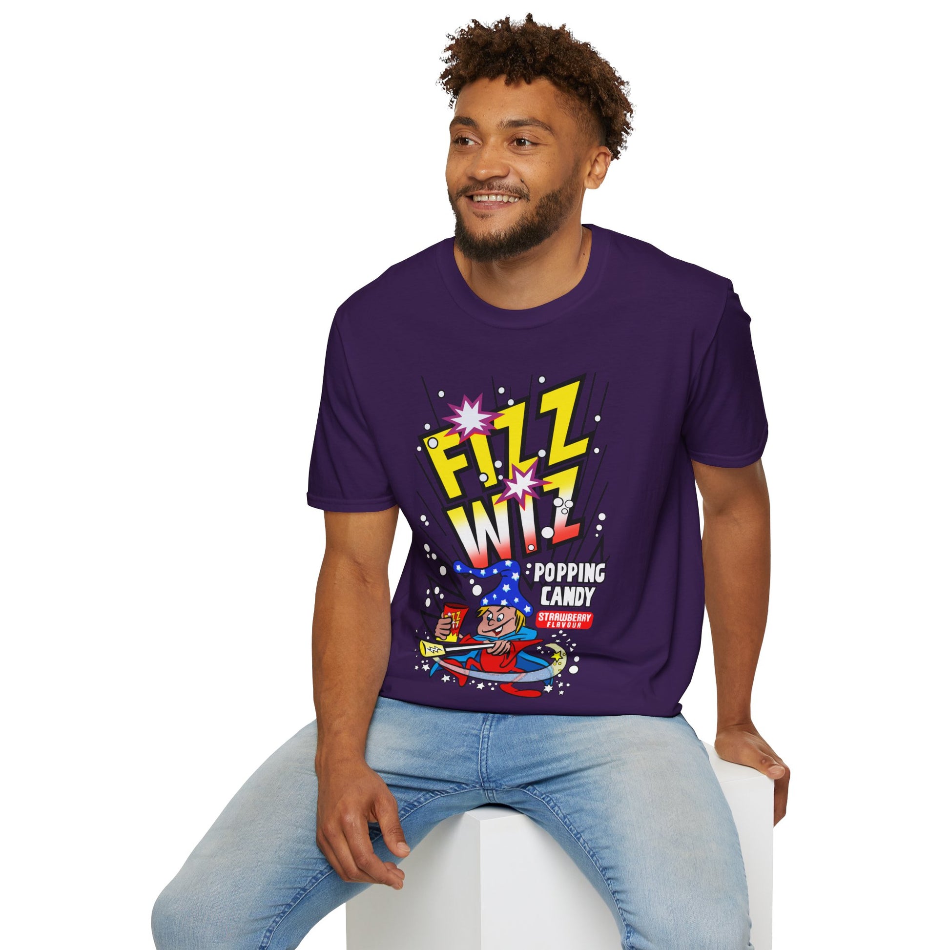 Person wearing a purple t-shirt with Fizz Wiz Popping candy colourful graphic design on a white background