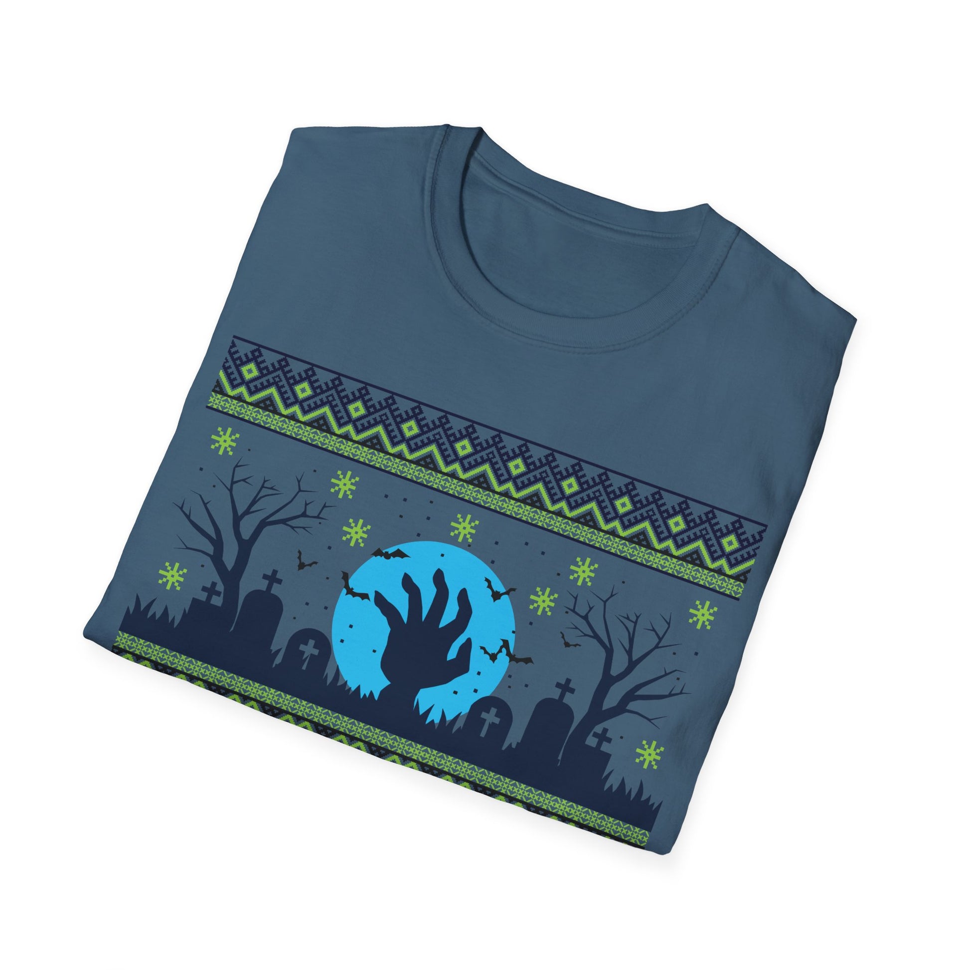 Folded blue t-shirt with a graphic design of a hand reaching out from a moonlit sky over a graveyard.