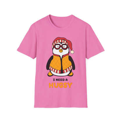 Pink t-shirt with a penguin graphic and I Need A Hugsy text
