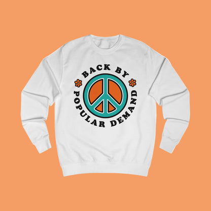 70s vibe white sweatshirt with peace sign, flowers design and text Back By Popular Demand around 