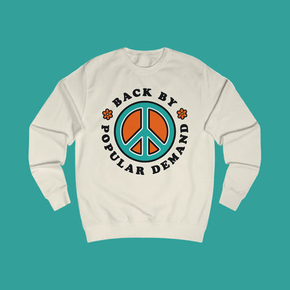 Beige sweatshirt with peace symbol and text 'Back by Popular Demand' on a white background