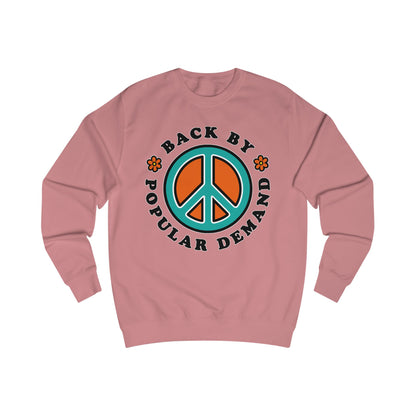 70s vibe Pink sweatshirt with peace sign, flowers design and text Back By Popular Demand around 
