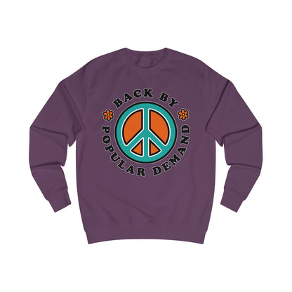 Purple sweatshirt with a peace sign design and text on a white background
