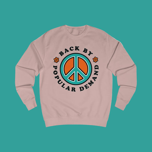 70s vibe Pink sweatshirt with peace sign, flowers design and text Back By Popular Demand around 