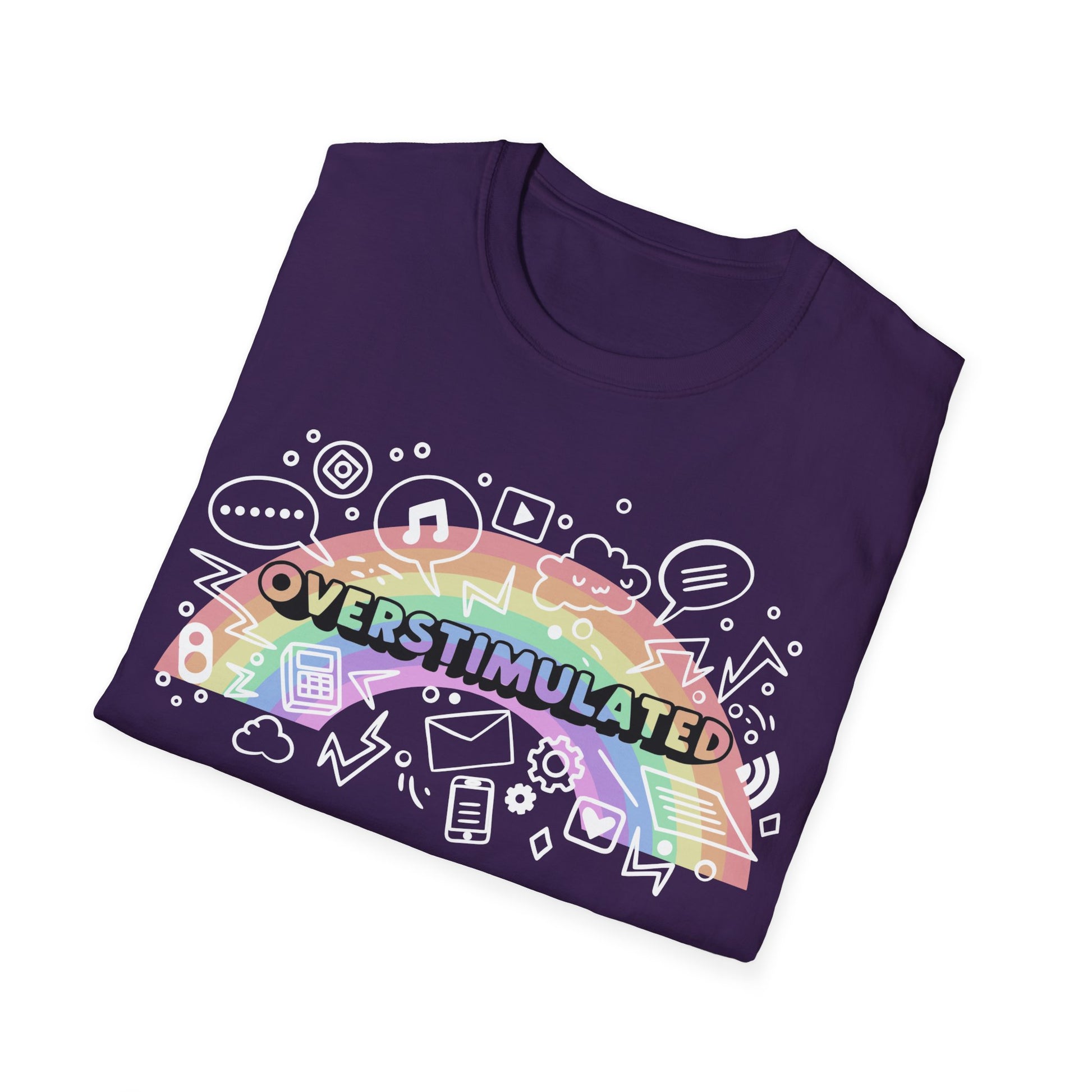 Folded purple t-shirt with colorful 'OVERSTIMULATED' design on a white background