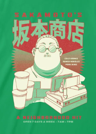 Close up of Green t-shirt with a graphic design of Sakamoto Days Hero character and text 