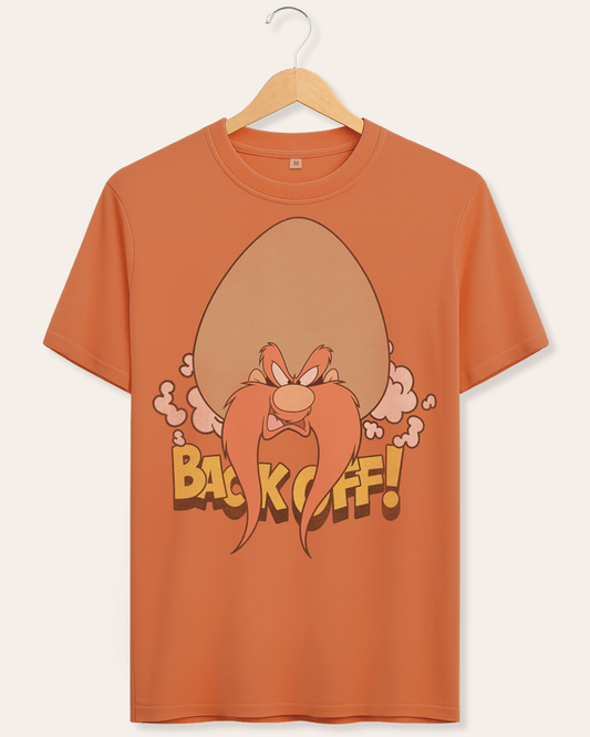 Official Looney Tunes Cinnamon t-shirt with Yosemite Sam cartoon character and 'Back Off!' text on a hanger against a cream background