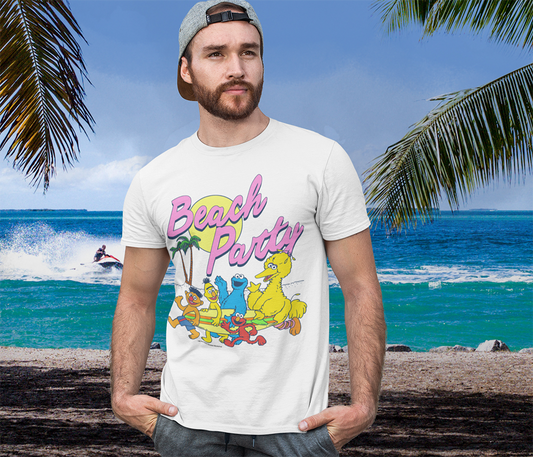 Man wearing Men's unisex short sleeve vintage cream Famous Forever T-shirt featuring Sesame Street Characters at the beach with Beach Party text
