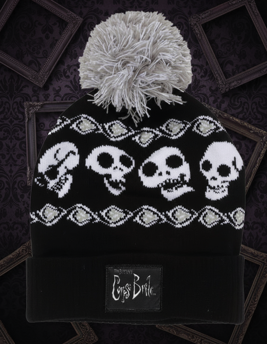 Black and white Corpse Bride beanie with skull pattern and pom-pom 