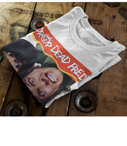 Retro Tees 90s Movie poster Drop Dead Fred unisex T-shirt. White short sleeve crew neck graphic movie design top laying in a Christmas display